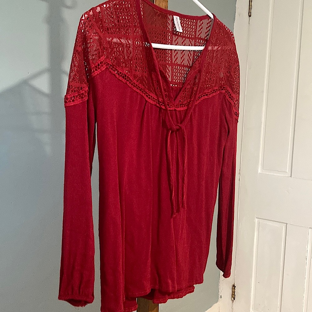 Cranberry long sleeve top with pretty details.